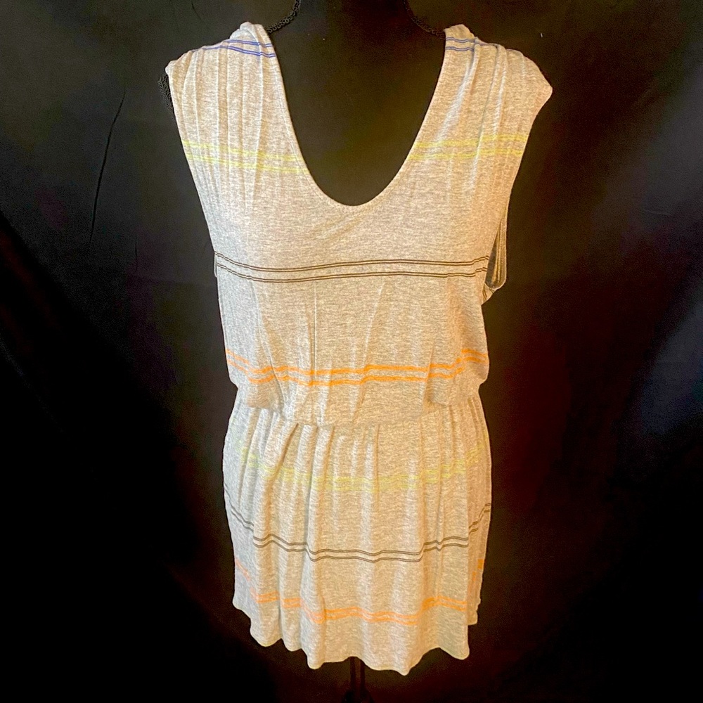 Black, coral and neon green stripes. 100% Rayon with a scoop neckline.
